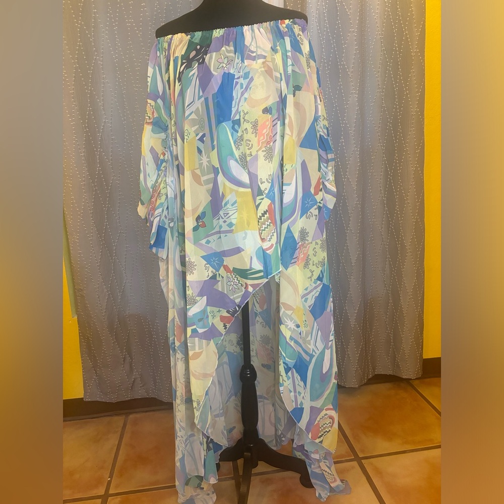 Asymmetrical dress with flair sleeves